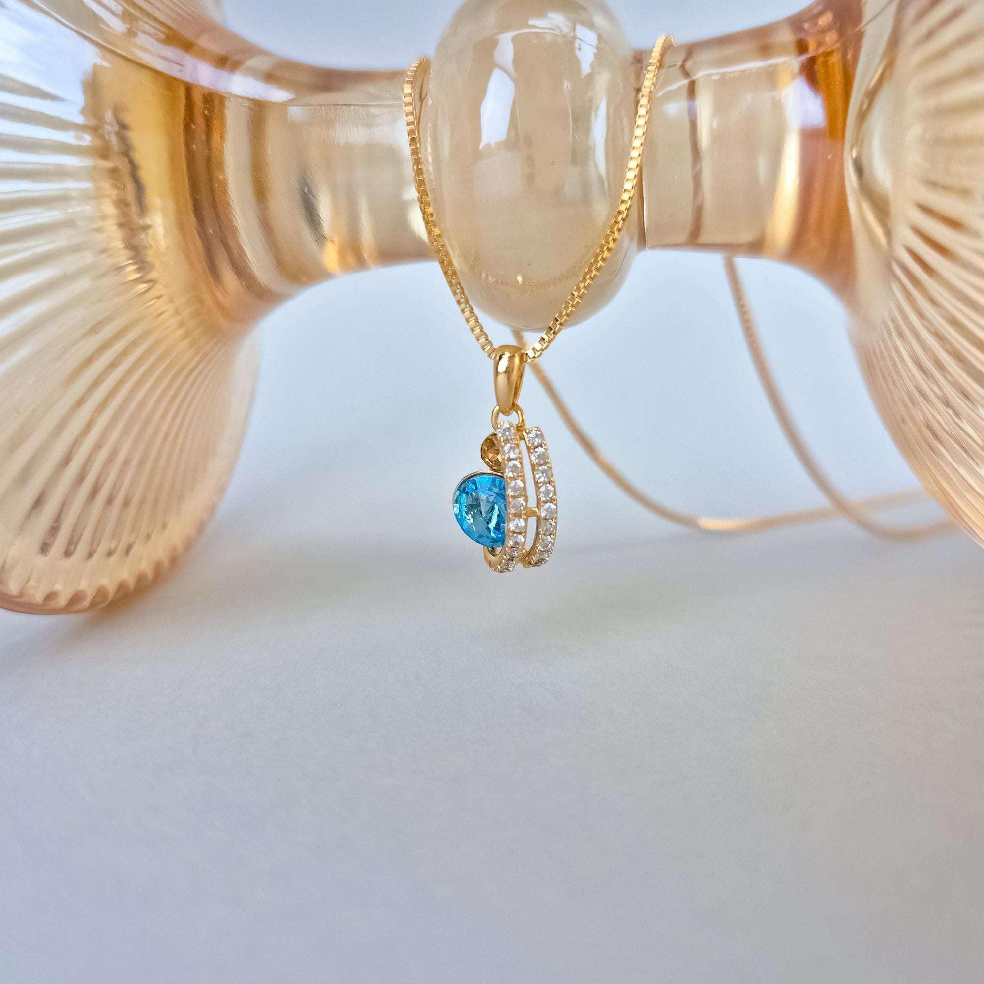 Eleganta sieviešu kaklarota ar zilu un dzintara krāsas Swarovski akmeni