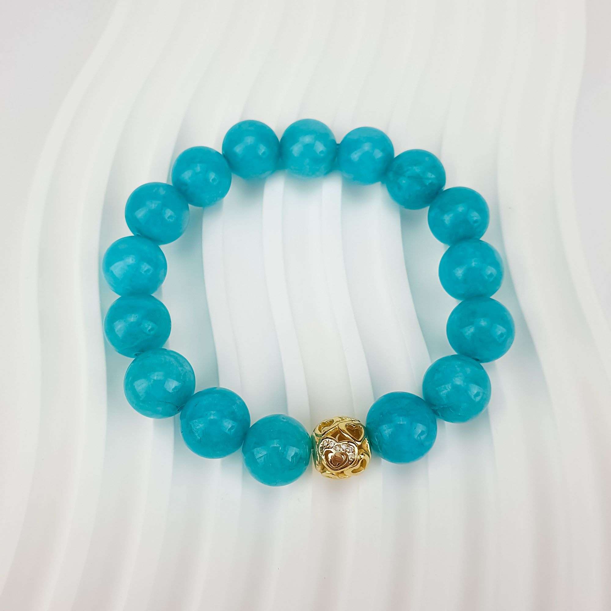 Krāsots ķīniešu nefrīts (kvarcs) – skaists zaļgani zils tonis