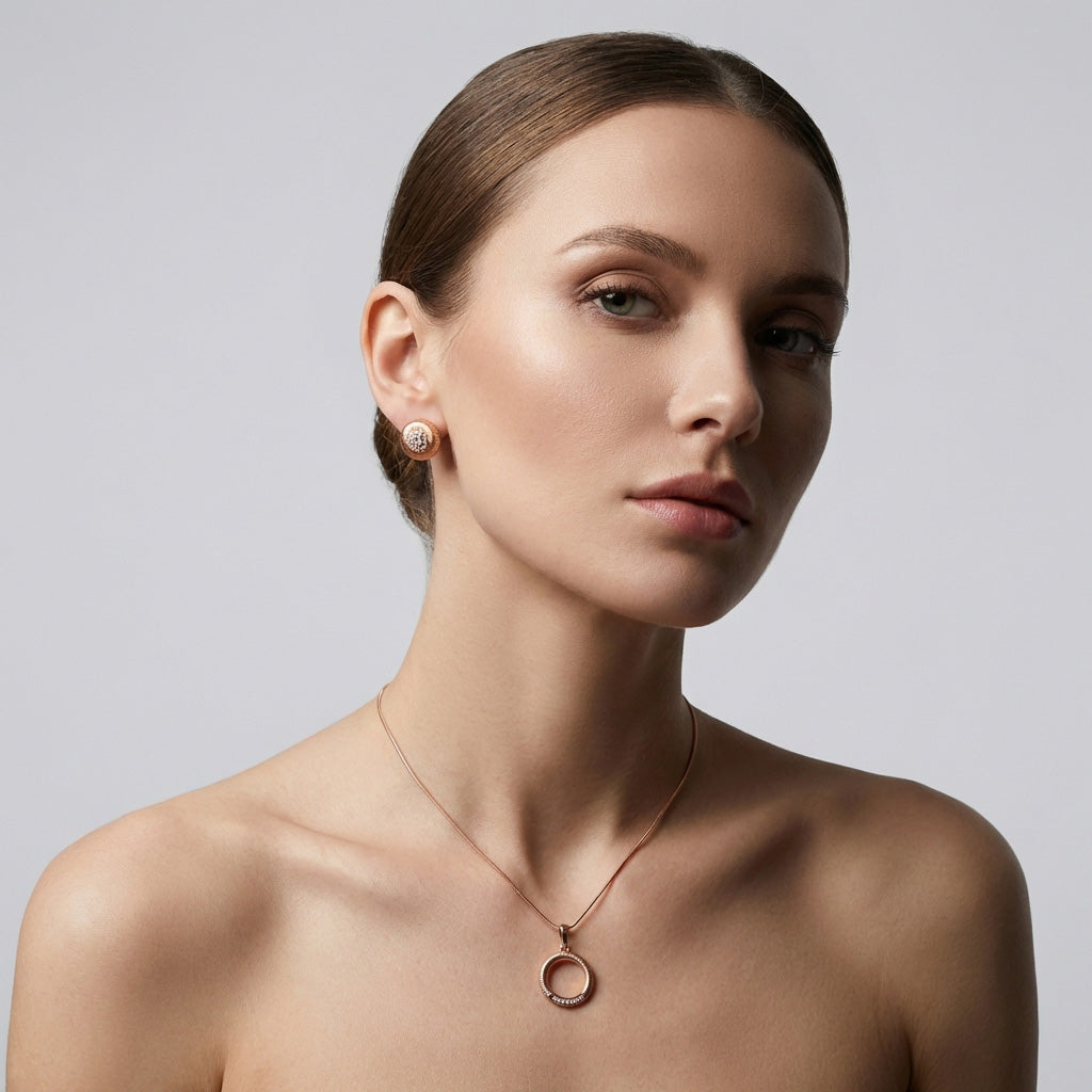 Rievotas paauksuotas papuošalų komplektas „Saulės ratas“